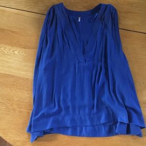 Free people top with high/low hem. Lined.